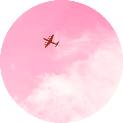 ピンク色の空を飛行機が飛ぶアイコン画像